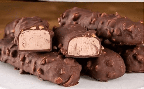 Barrette di cioccolato con copertura di noci